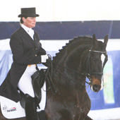 Leslie Morse and Tip Top 962 are named National Grand Prix Champions at the USEF Dressage Festival of Champions.