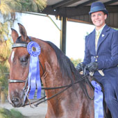 Brittney Yehling and Soldier Field win HA/AA Country English Pleasure Open and Saddle Seat Equitation 17 & Under.