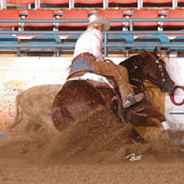 Anne Reynolds and Shiney And Verysmart win the NRCHA Snaffle Bit Futurity Non Pro Championship.