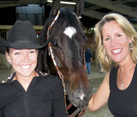 Kelsey Nichols (left) and her Bayside Sailor, pictured with Carolyn Trammell, win the $1,000 Limited Non Pro Derby, NRHA Youth 14-18, and NRHA Youth Rookie.