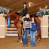 Open Equitation winner Blake Lindsley and Pascal receive their award from presenters Melissa Braunstein, VP Marketing of Blenheim EquiSports and Jenny Fine of Royal Champion.