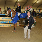 Bob Drennen presents Rich Fellers with his second of three grand prix trophies. 