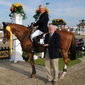 Rich Fellers accepts the 2011 Catena Leading Grand Prix Rider Award aboard Flexible from Tony Hitchcock.