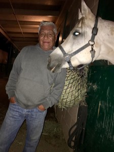 At the Del Mar Fairgrounds duruing evacuations, trainer Manny Calvario with RajaliKa