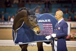 After a magnificent commemorative ride before an adoring Del Mar crowd April 28, Steffen Peters and Legolas 92 share a moment in the dressage legend’s retirement ceremony at the Del Mar National Horse Show. (Terri Miller photo)